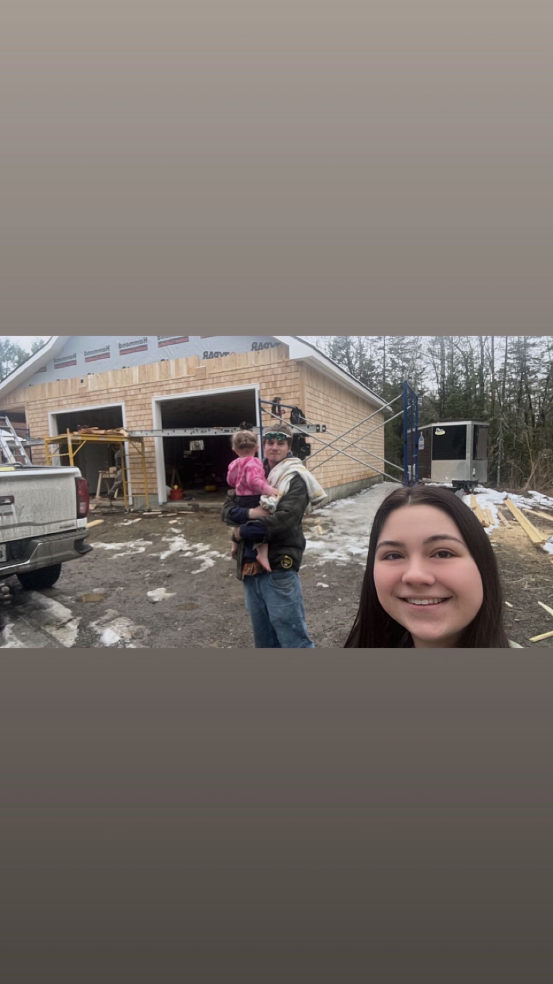 Keith Pomeroy and family at a cedar-shingled garage build in Maine