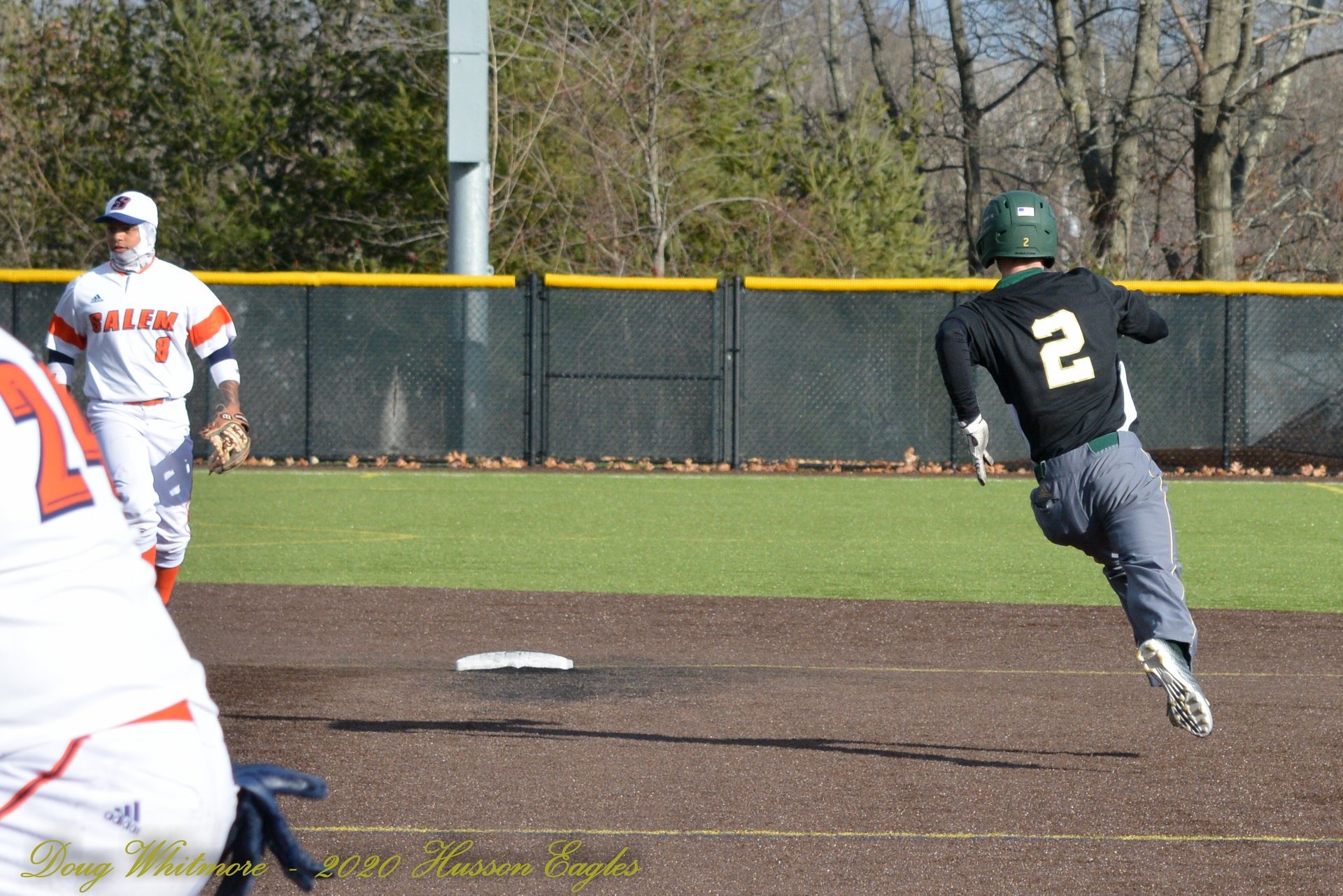 Keith Pomeroy running the bases playing college baseball for Husson University